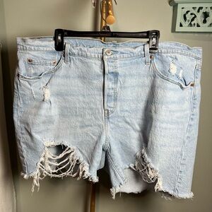 Levi's 501 Blue Jean Shorts with Distressed Rips and High-Waisted Fit